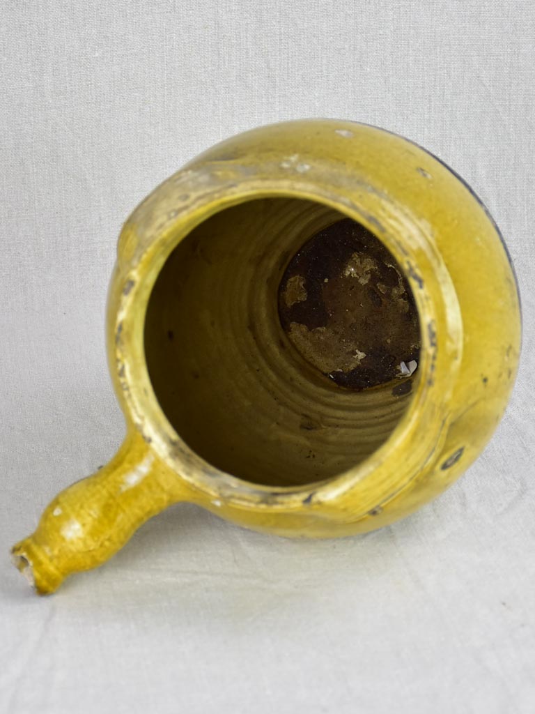 Early 19th Century French cooking clay pot with yellow glaze and handle