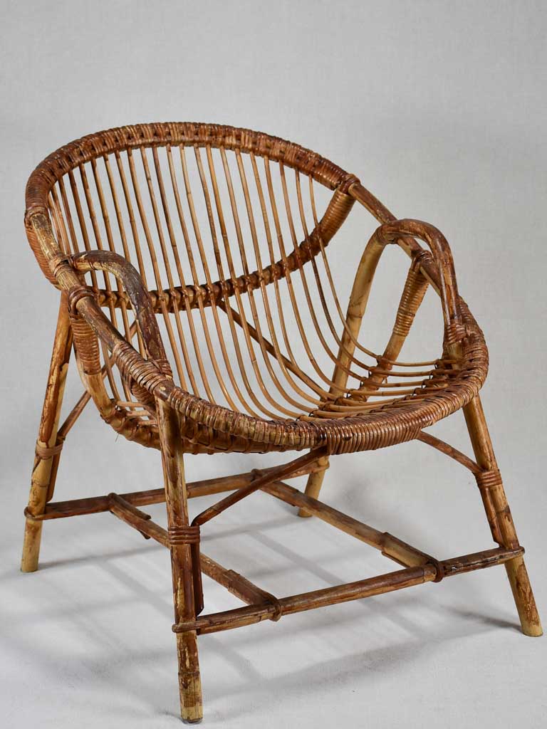 Pair of low rattan armchairs for a winter garden