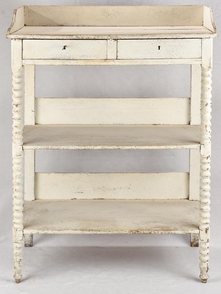 Late 19th century shelving unit with white patina