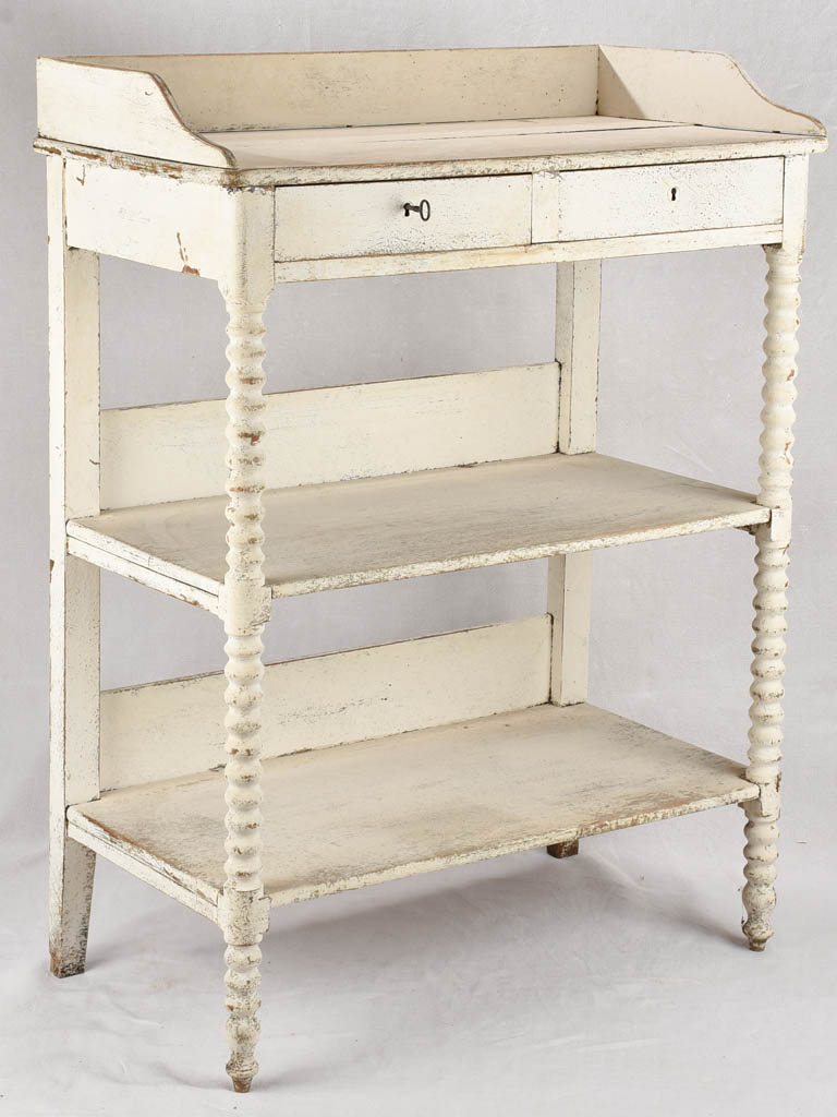 Late 19th century shelving unit with white patina