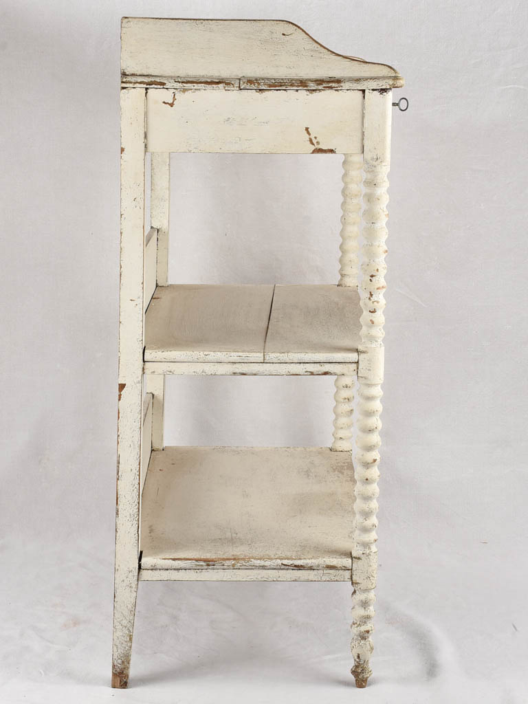 Late 19th century shelving unit with white patina