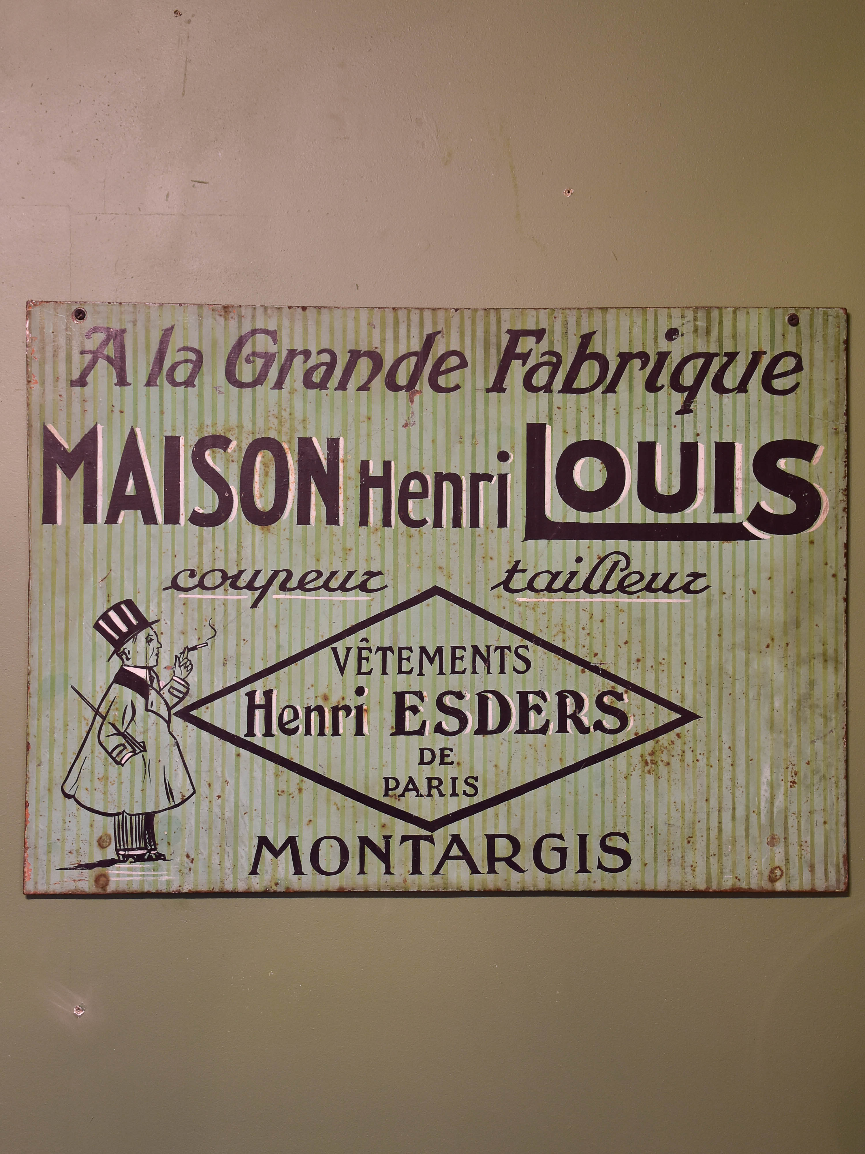 Antique French tailor's sign