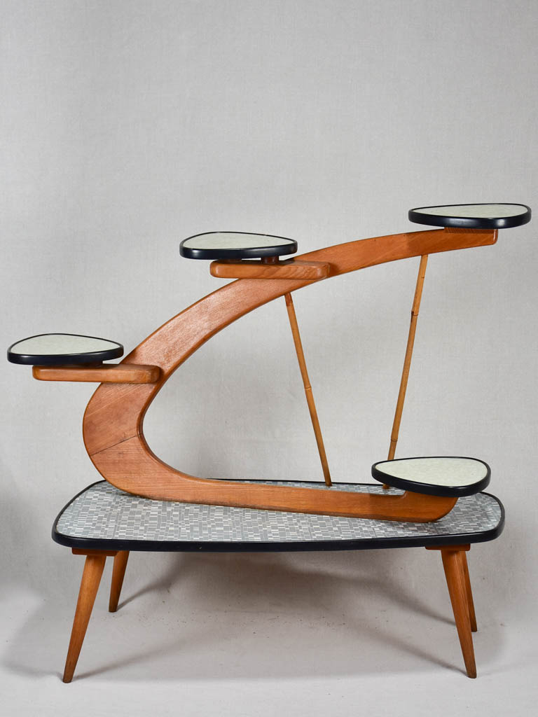 Unusual Formica and teak side table with little shelves