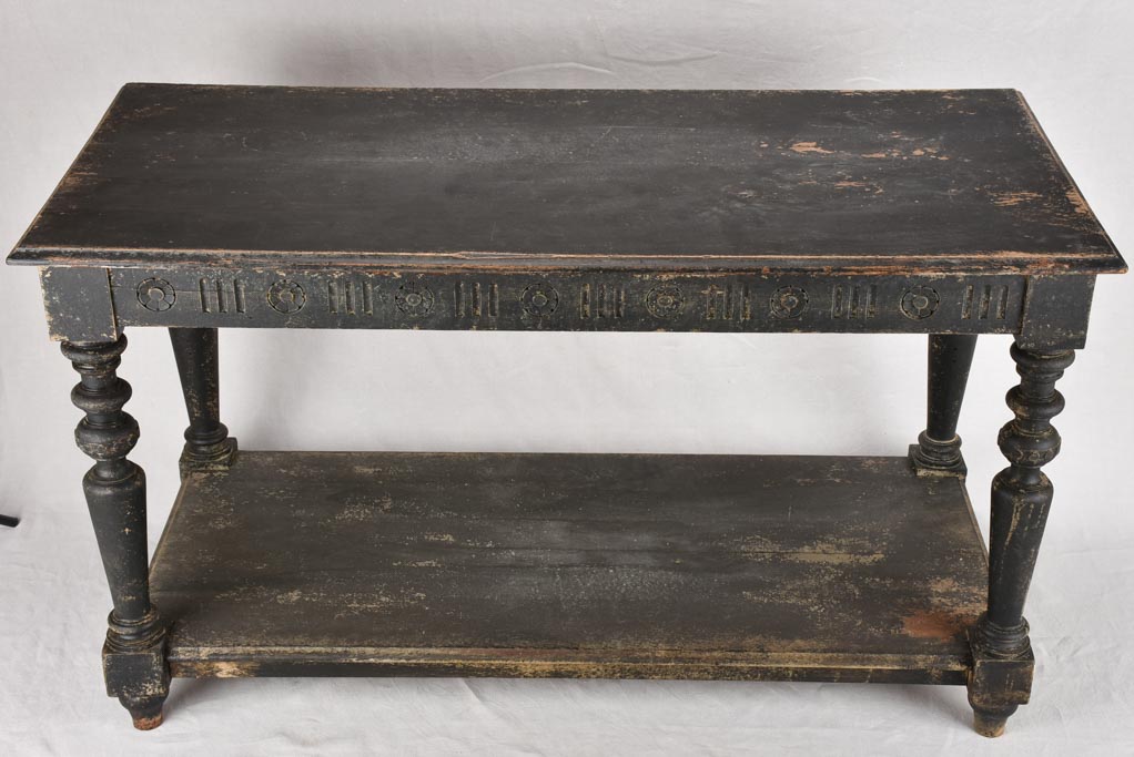 Late 19th century draper table with black patina