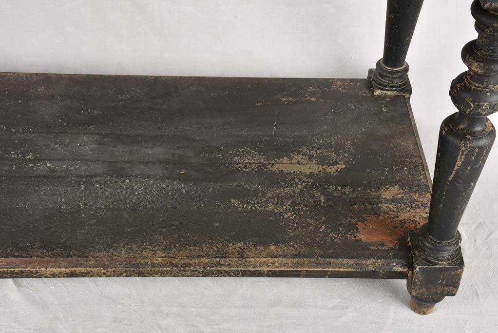 Late 19th century draper table with black patina