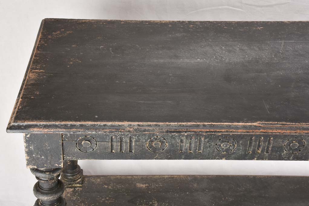 Late 19th century draper table with black patina