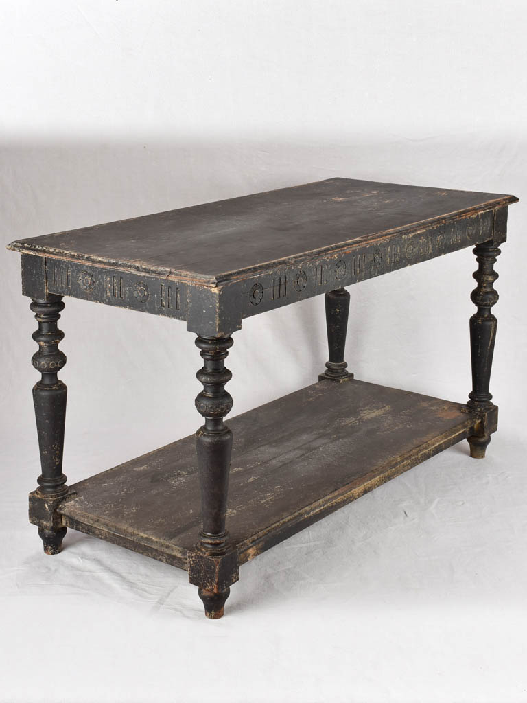 Late 19th century draper table with black patina