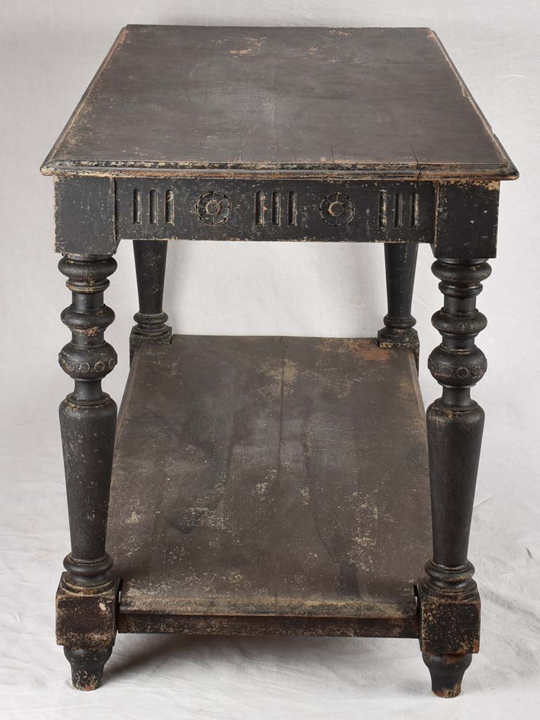 Late 19th century draper table with black patina