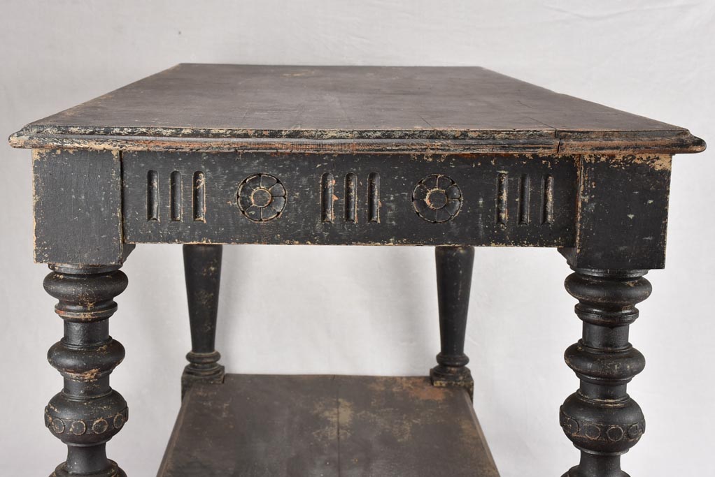 Late 19th century draper table with black patina