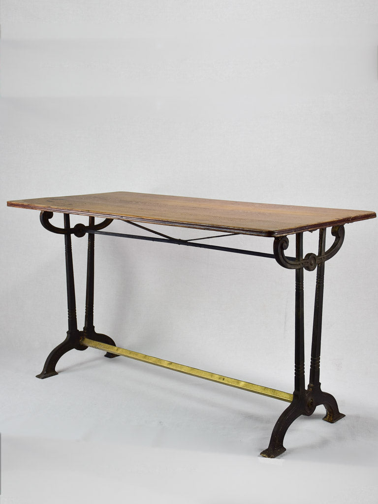 Antique French bistro table with oak top and cast iron base 25¼" x 51¼"