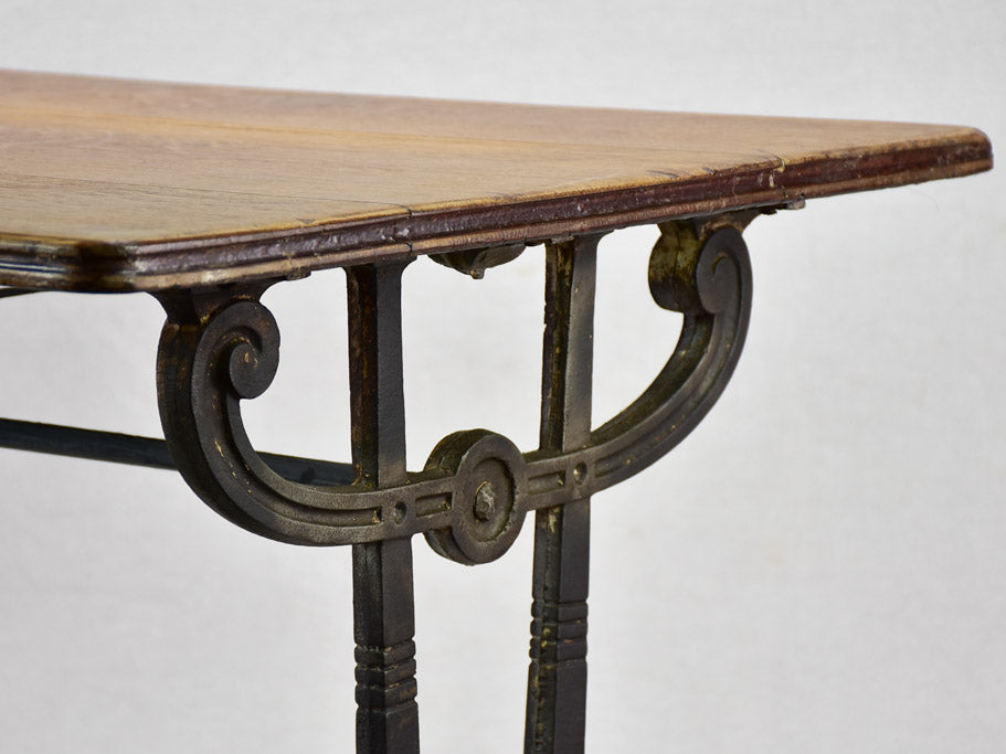 Antique French bistro table with oak top and cast iron base 25¼" x 51¼"