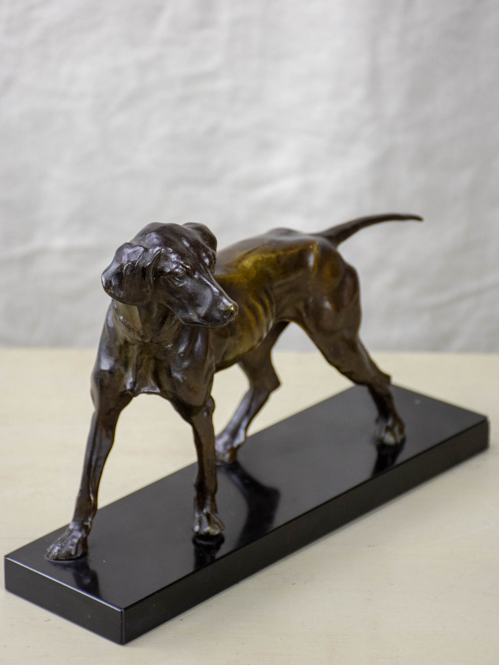 Vintage bronze sculpture of a hunting dog