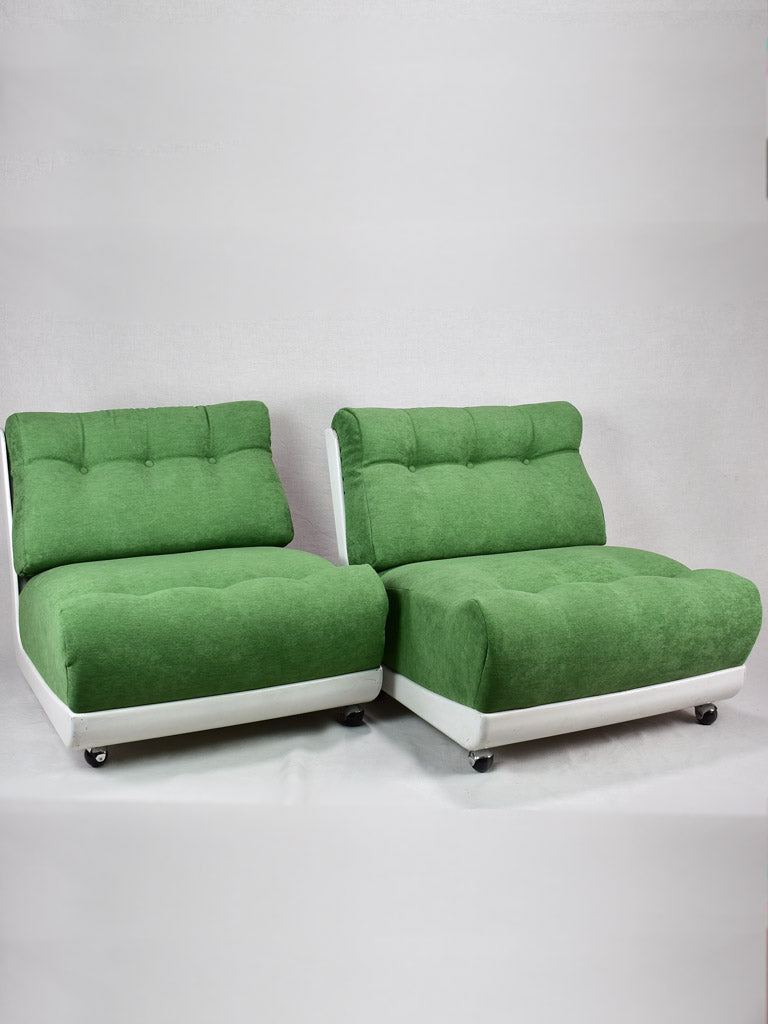 Pair of large vintage lounge chairs with green upholstery