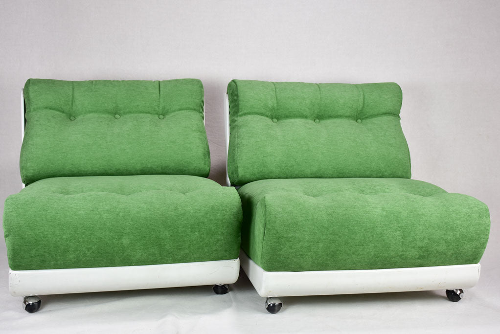 Pair of large vintage lounge chairs with green upholstery