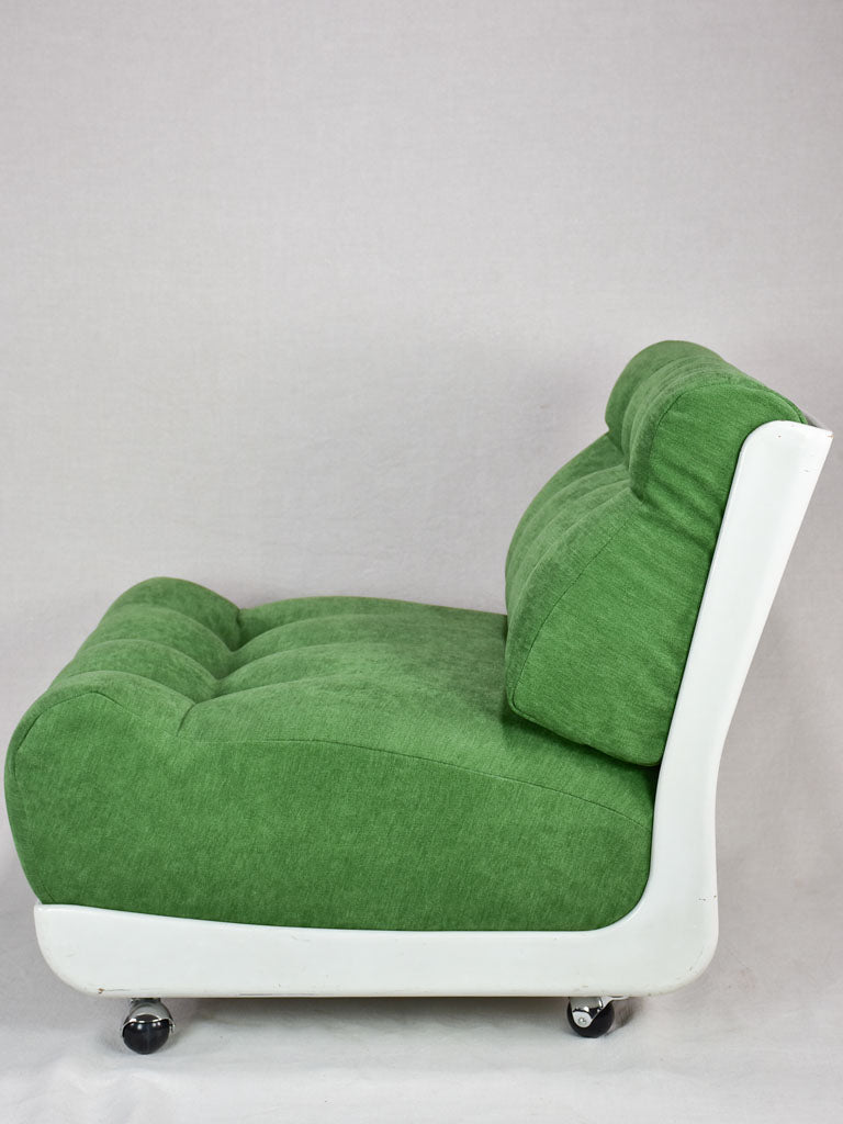 Pair of large vintage lounge chairs with green upholstery