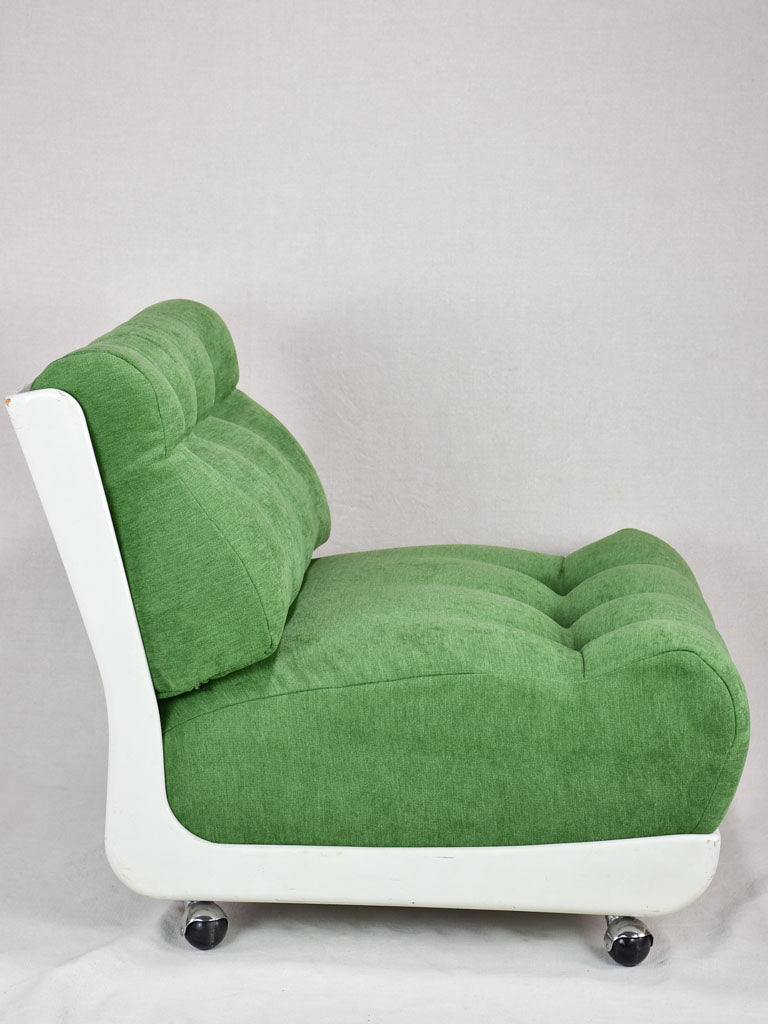 Pair of large vintage lounge chairs with green upholstery