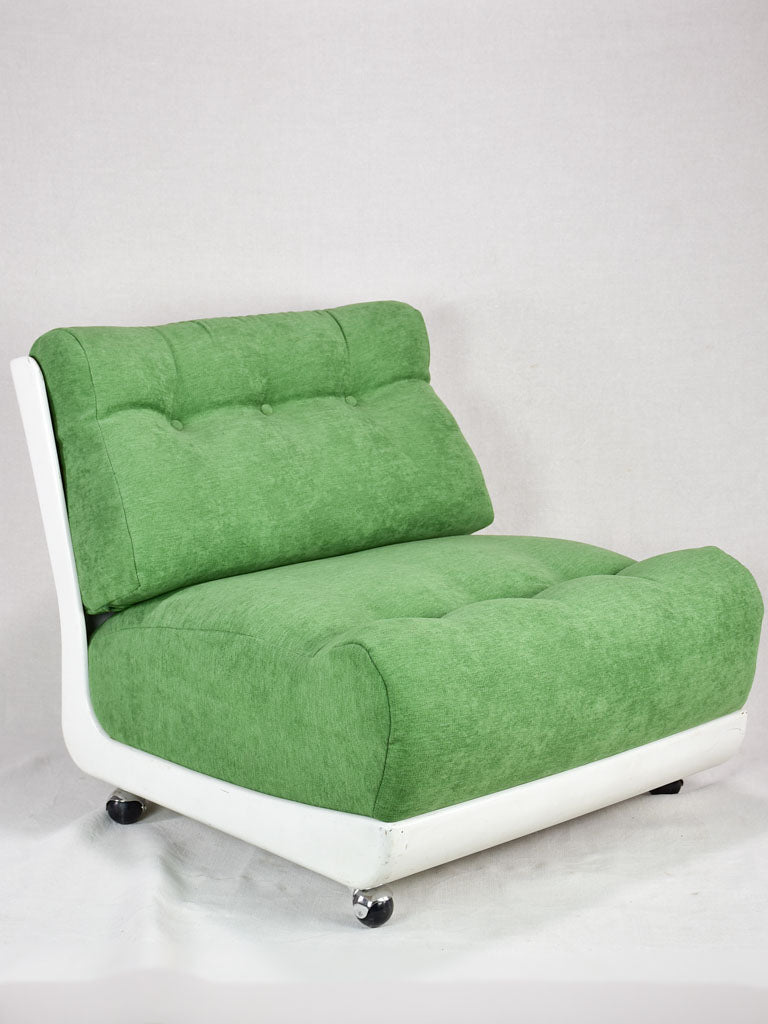 Pair of large vintage lounge chairs with green upholstery