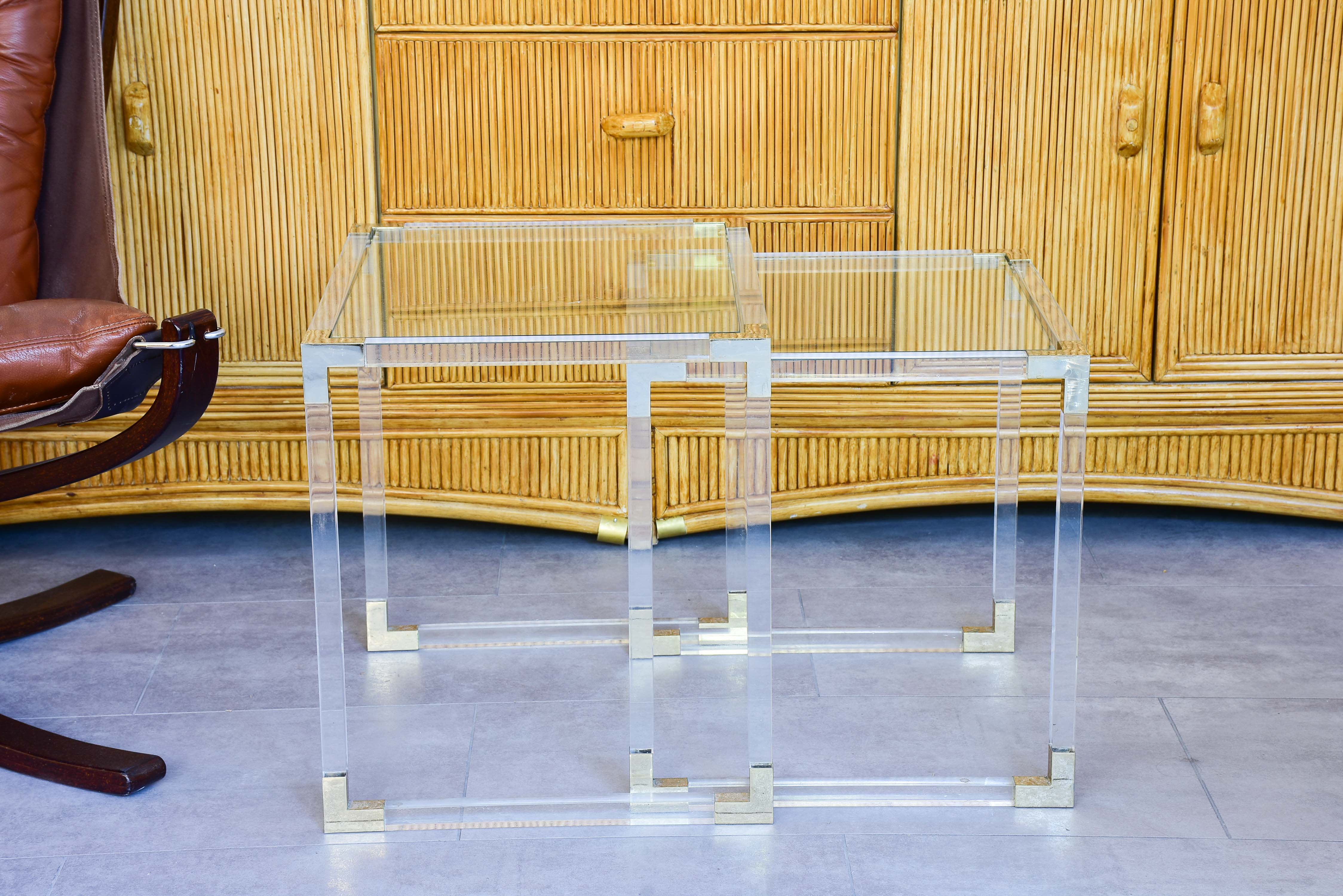 Two pairs of perspex nesting tables