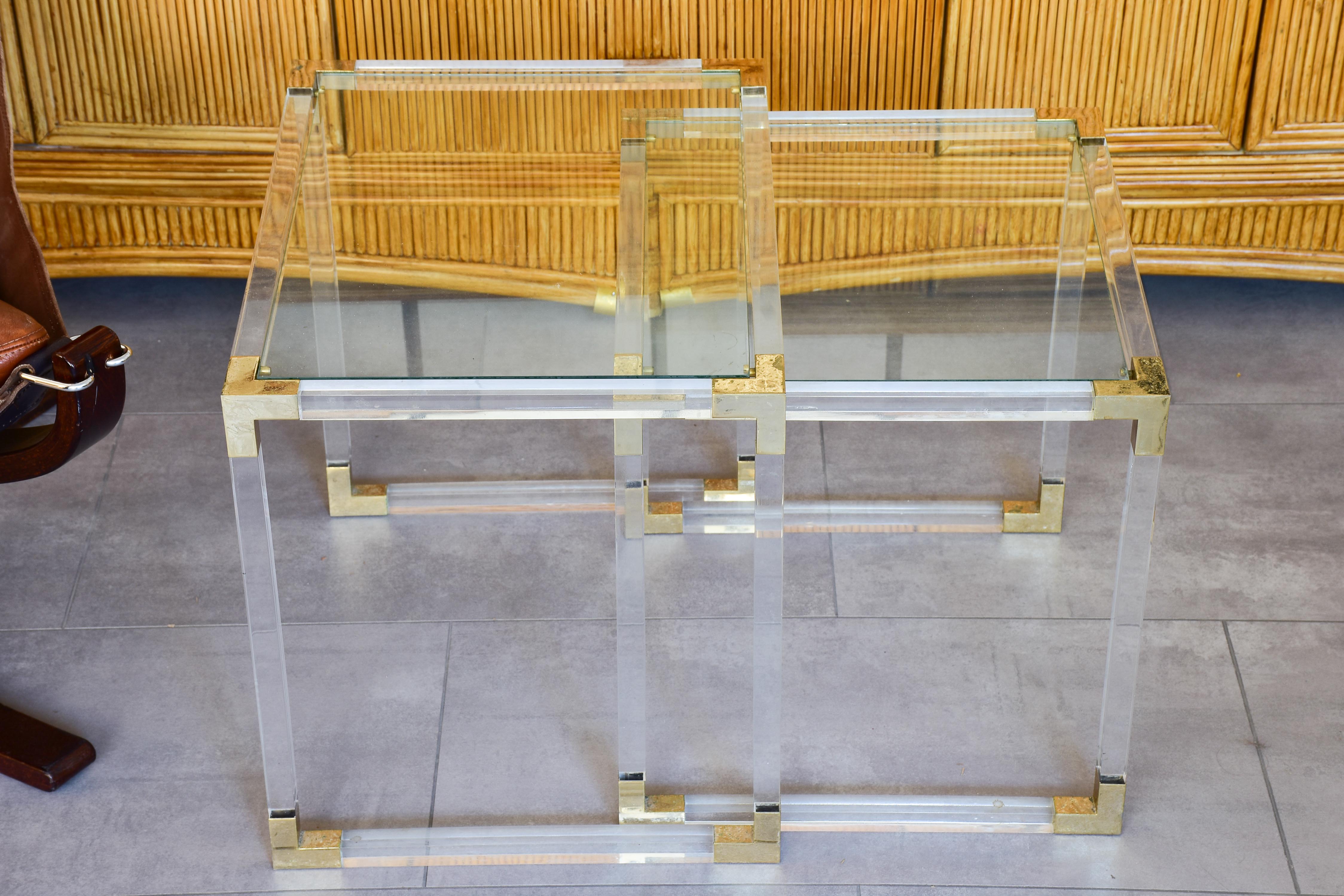 Two pairs of perspex nesting tables