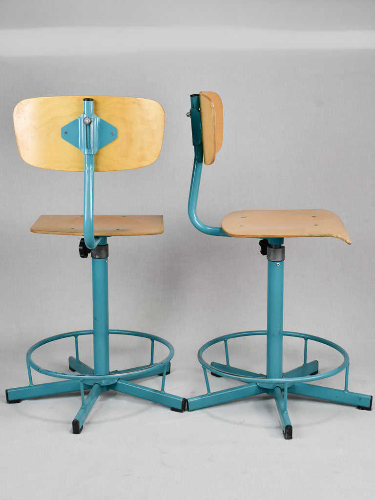 Pair of blue adjustable stools from a Swiss art college