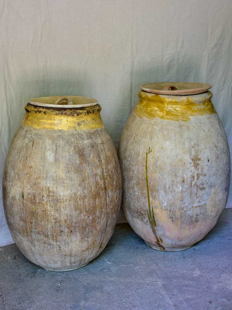 Two very large 18th Century Biot Jars with terracotta lids 41"