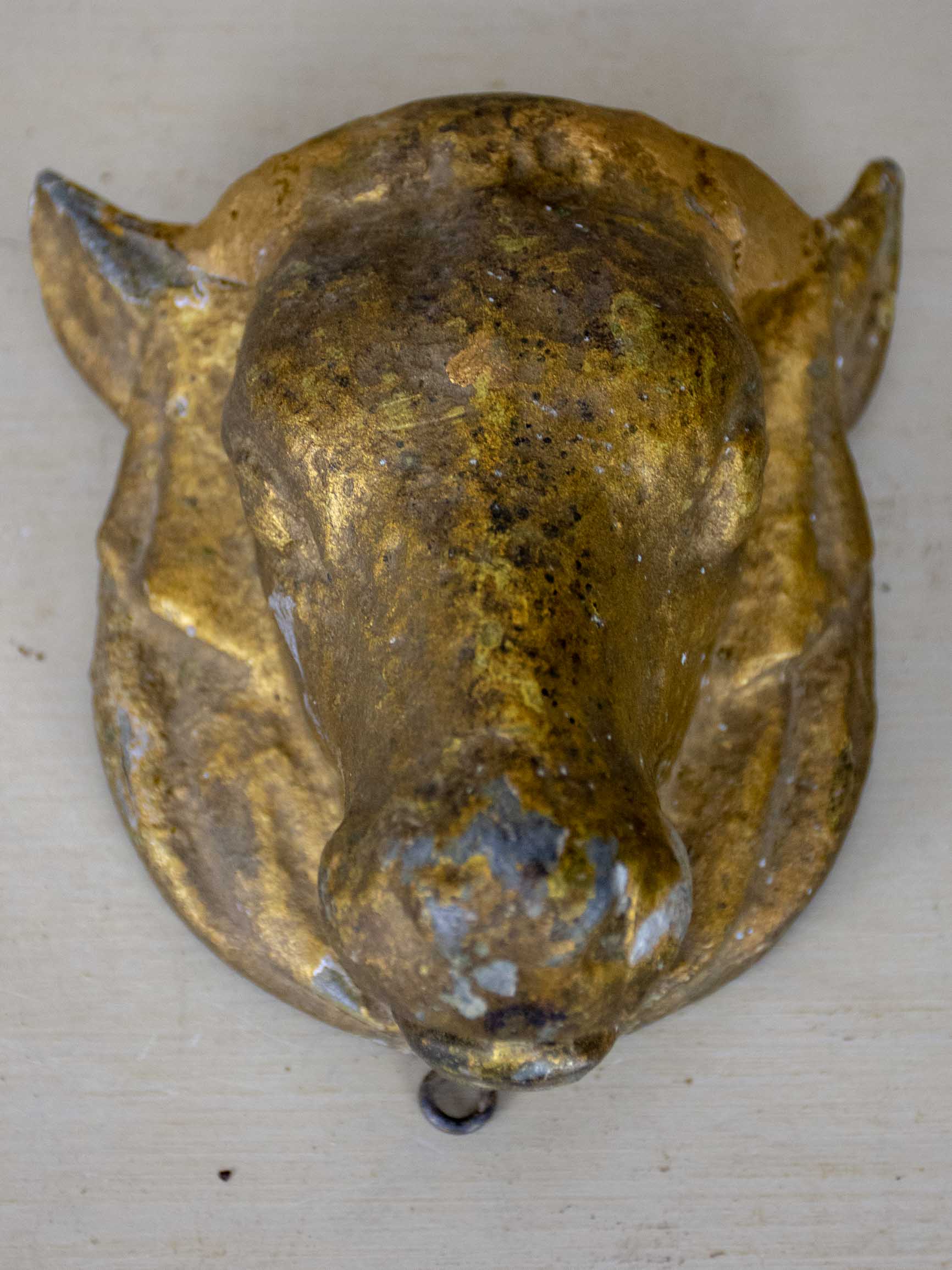 Antique cast iron cow's head from a butcher's table