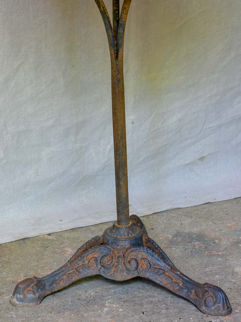 Small antique French bistro table with zinc top and cast iron base