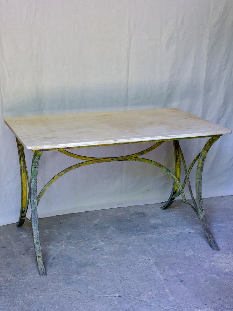 Late 19th Century marble top table with riveted iron base 47¼" x 31½"