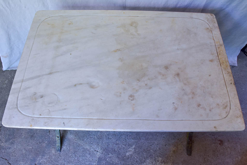 Late 19th Century marble top table with riveted iron base 47¼" x 31½"