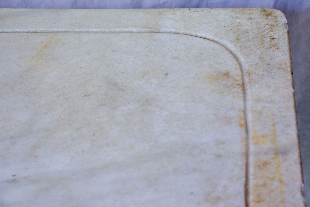 Late 19th Century marble top table with riveted iron base 47¼" x 31½"