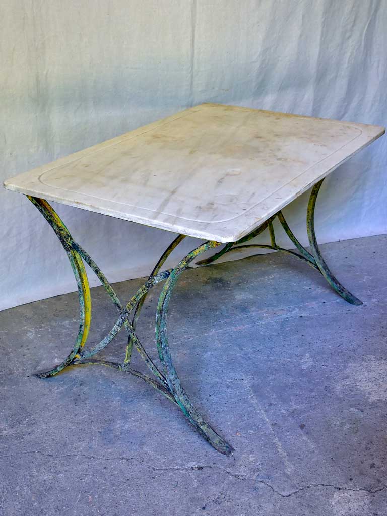 Late 19th Century marble top table with riveted iron base 47¼" x 31½"