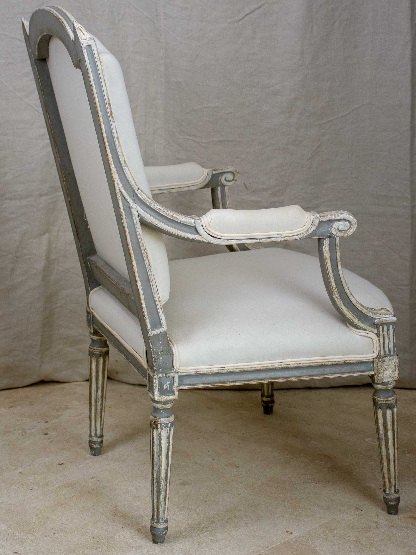 Pair of antique French Louis XVI armchairs