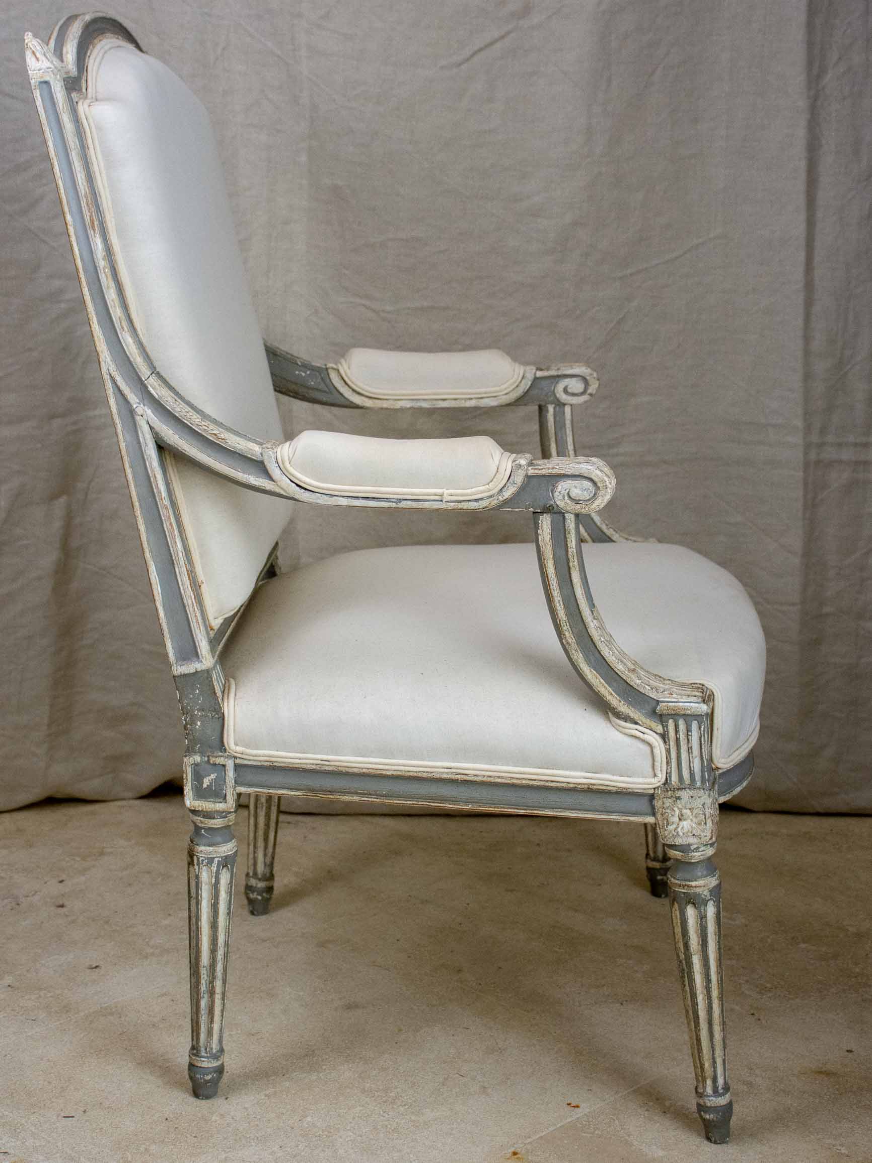 Pair of antique French Louis XVI armchairs