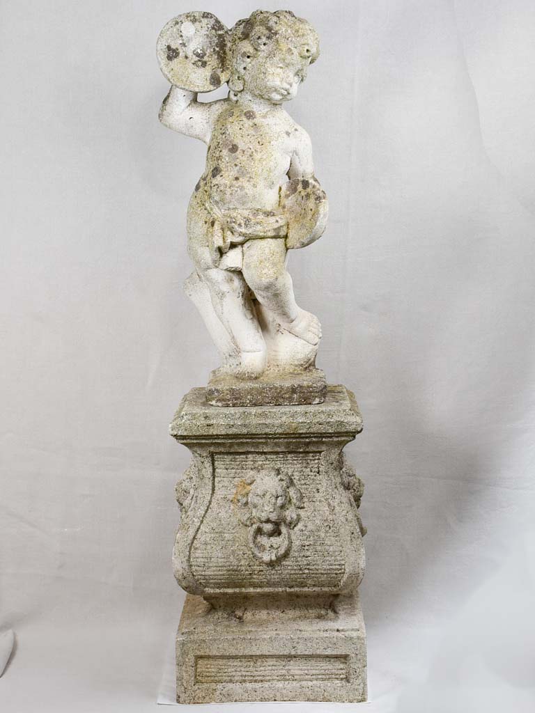 Antique French garden sculpture - cherub on a podium