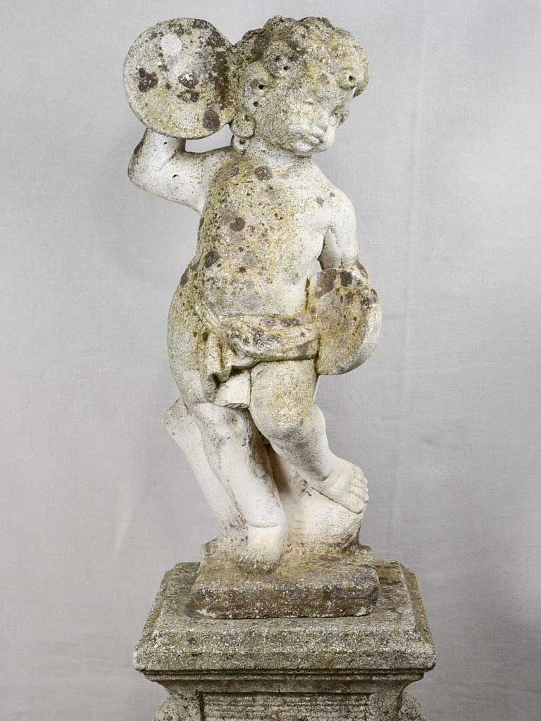 Antique French garden sculpture - cherub on a podium