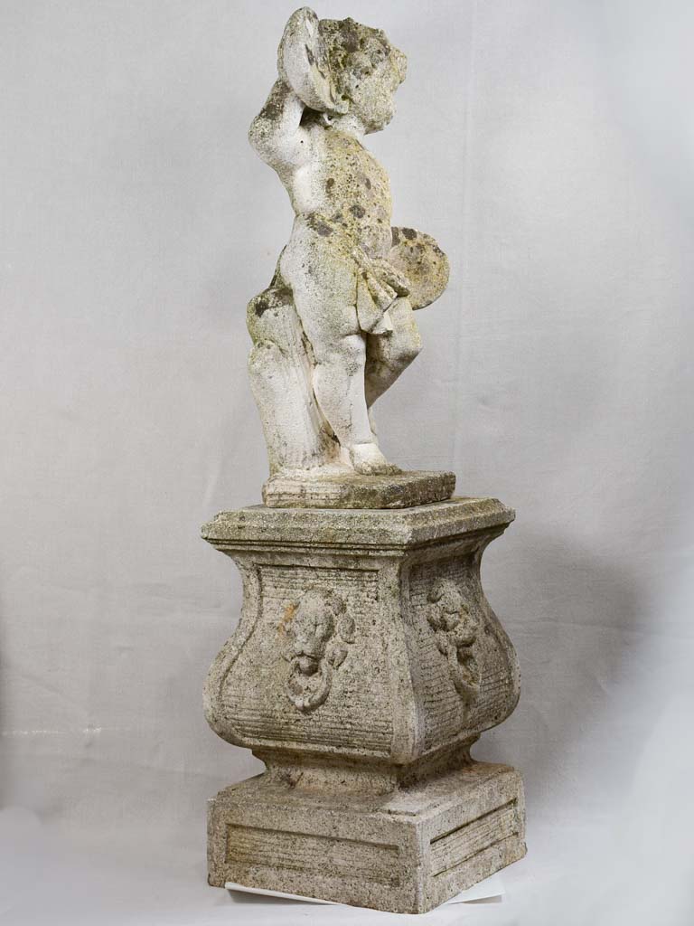 Antique French garden sculpture - cherub on a podium