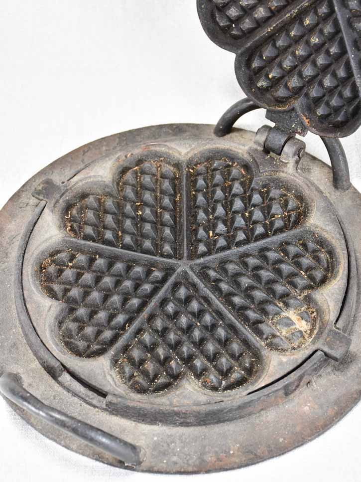 Nineteenth-century cast iron waffle iron - heart shaped 13¾"