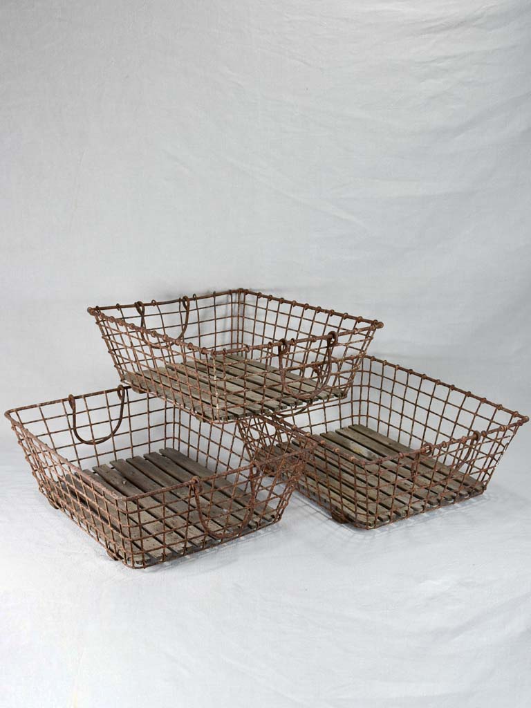 Collection of three shallow antique French oyster baskets