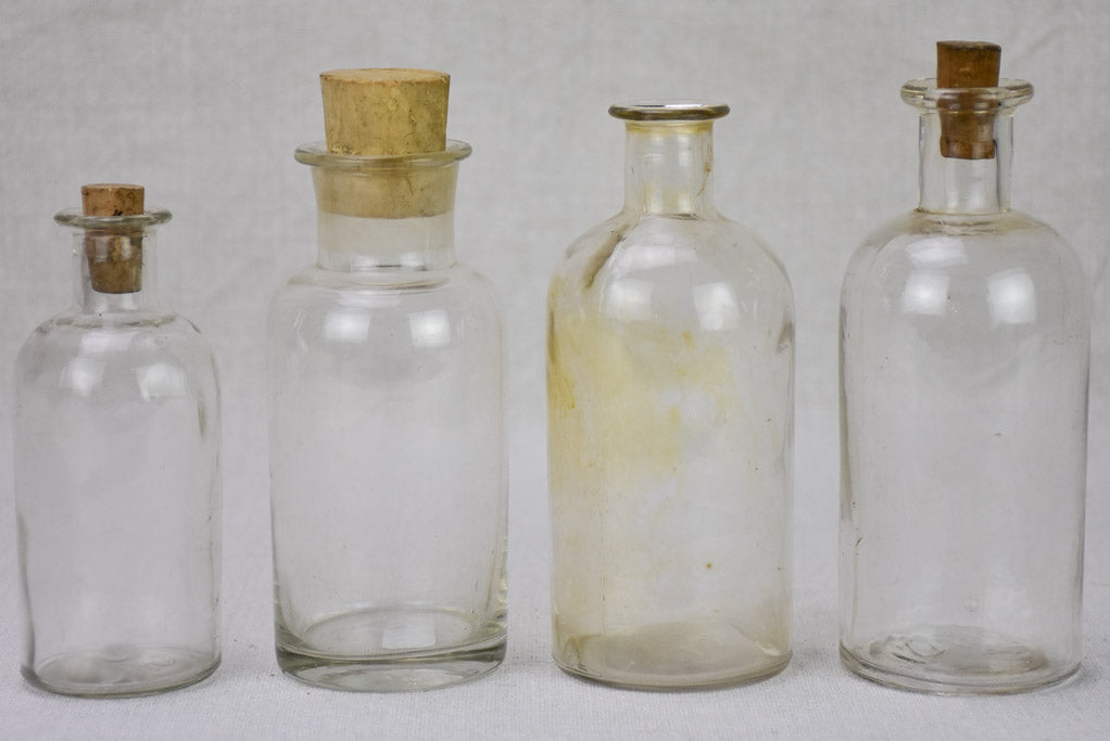 Collection of four small pharmacy flasks - 19th century blown glass