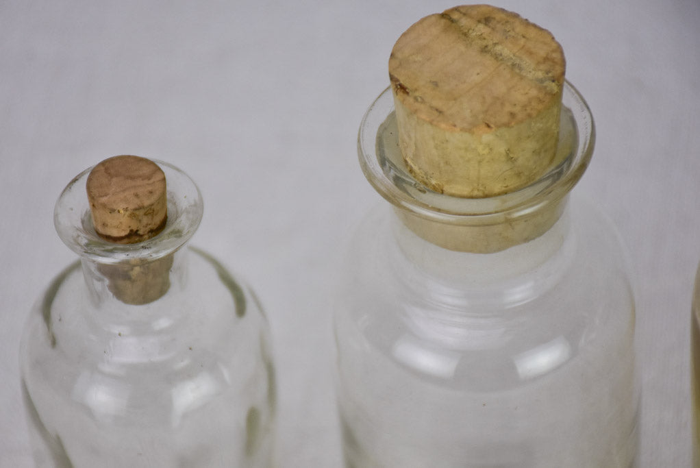 Collection of four small pharmacy flasks - 19th century blown glass