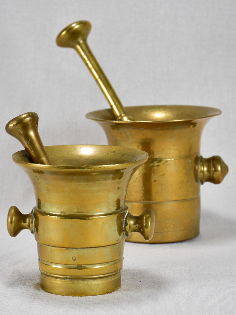 Two early twentieth-century bronze mortars and pestles