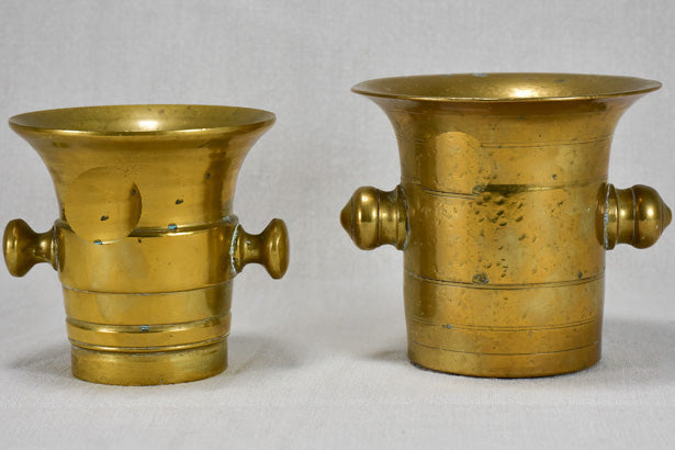 Two early twentieth-century bronze mortars and pestles