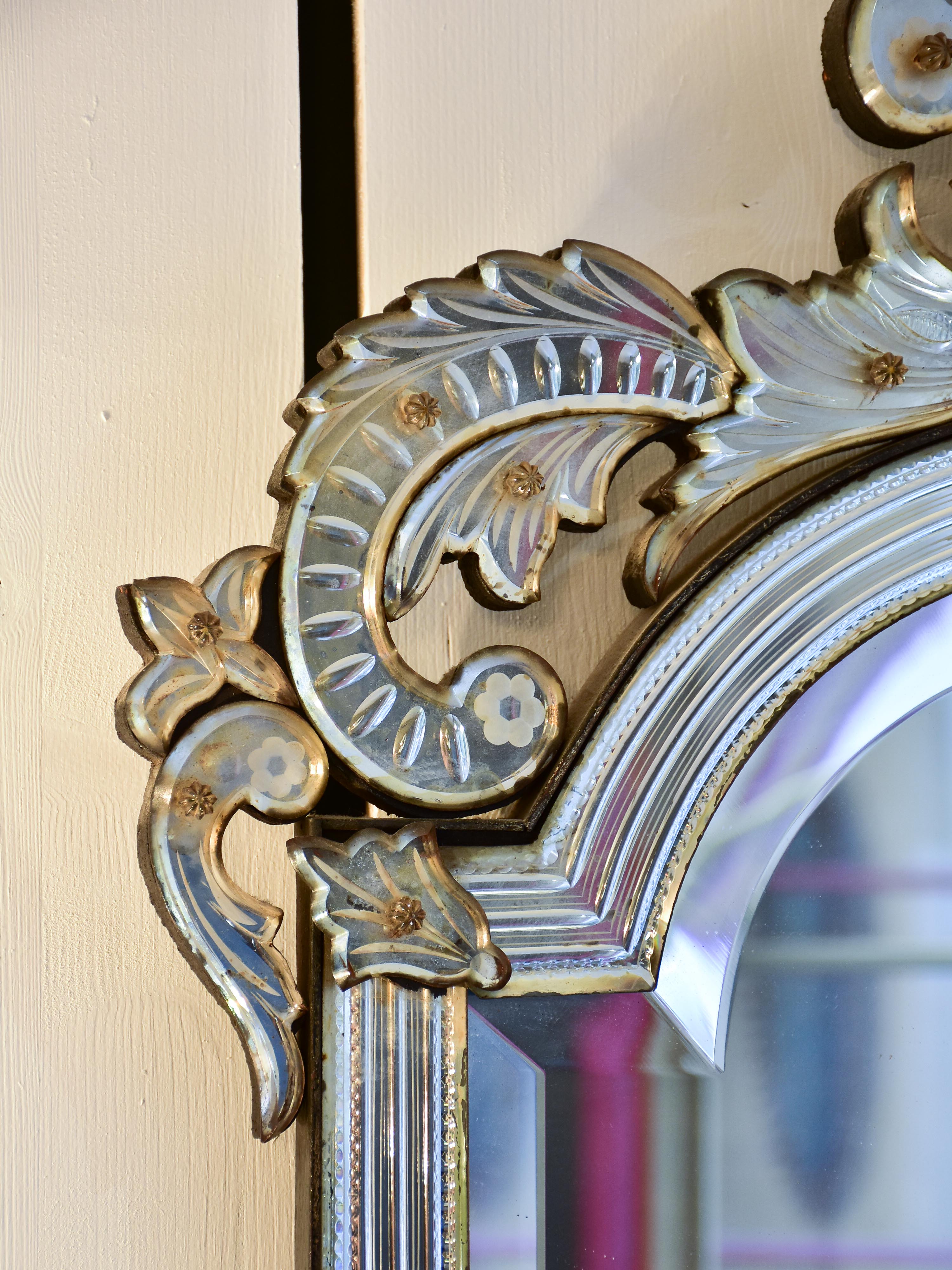 Antique Venetian mirror with decorative frame