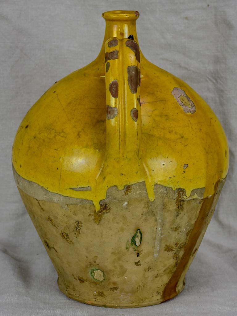 19th Century French water pitcher with yellow glaze