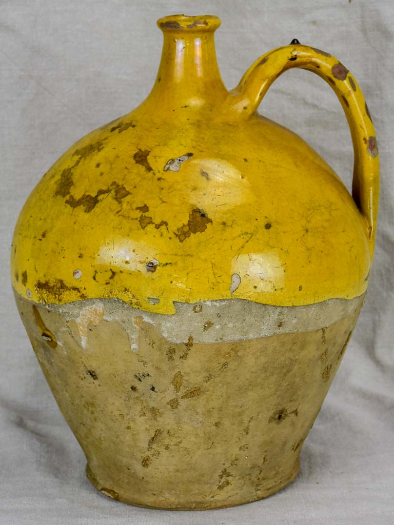 19th Century French water pitcher with yellow glaze