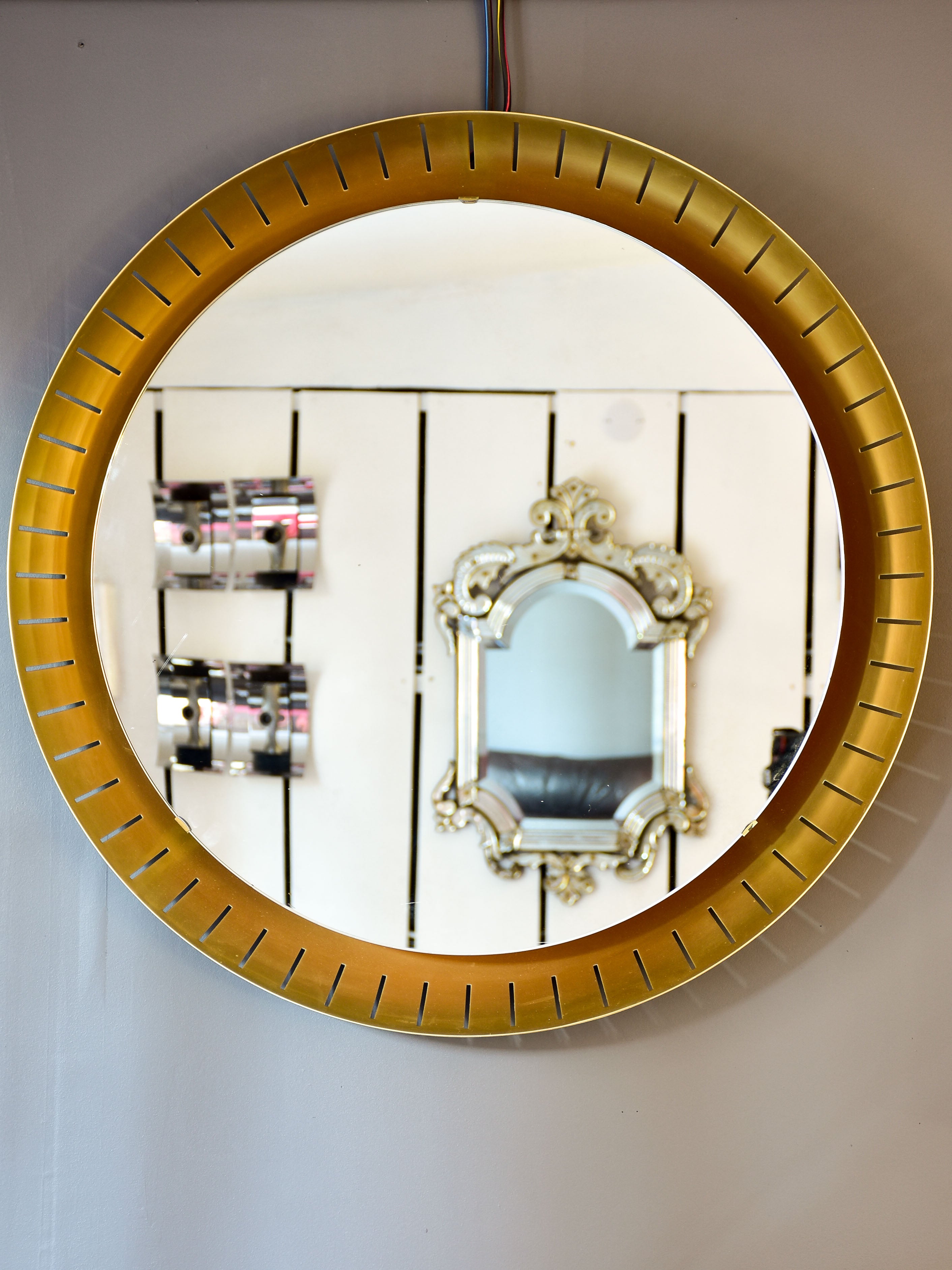 Pair of large round illuminated Stilnovo mirrors