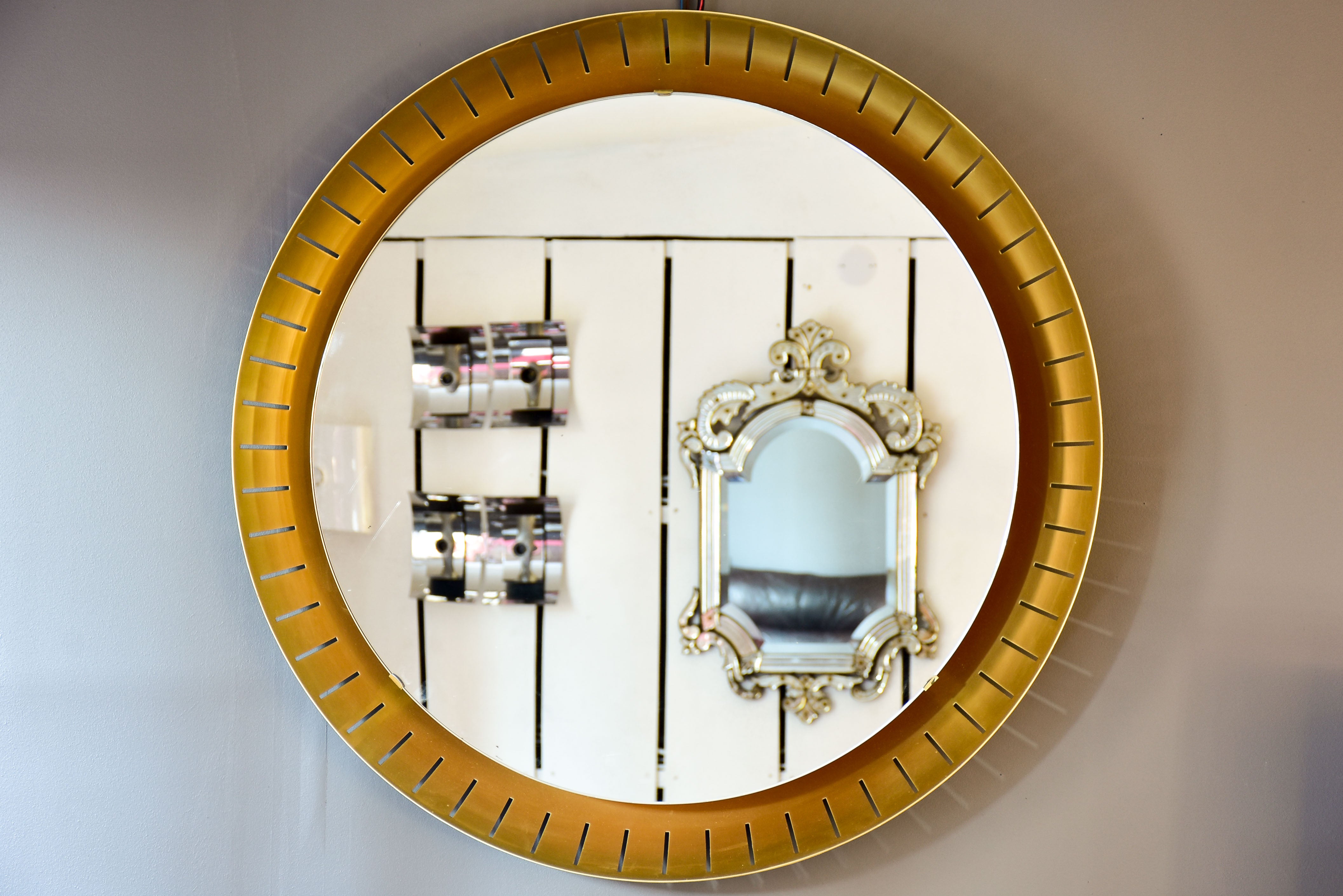 Pair of large round illuminated Stilnovo mirrors