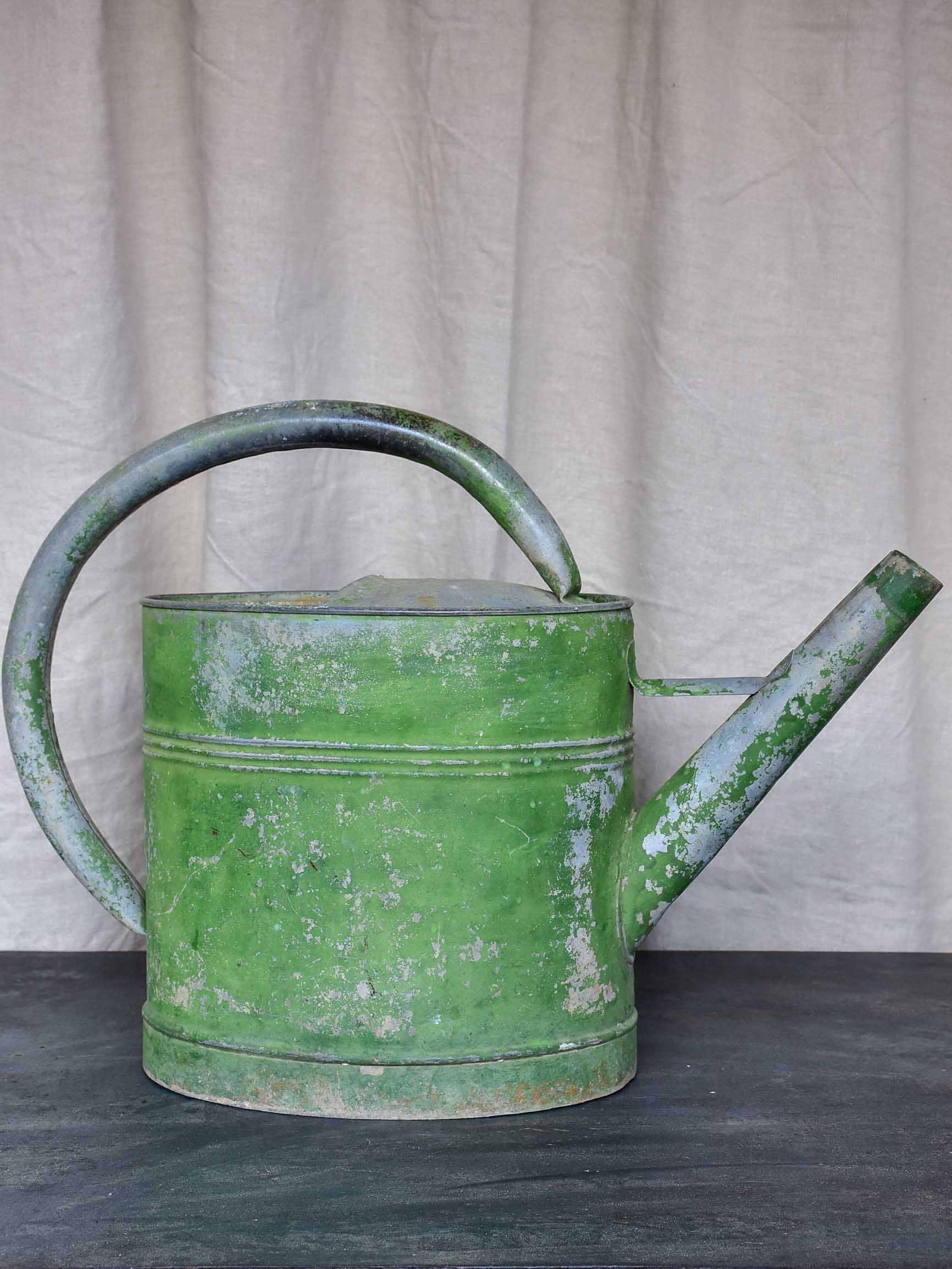 Early 20th Century watering can with green patina