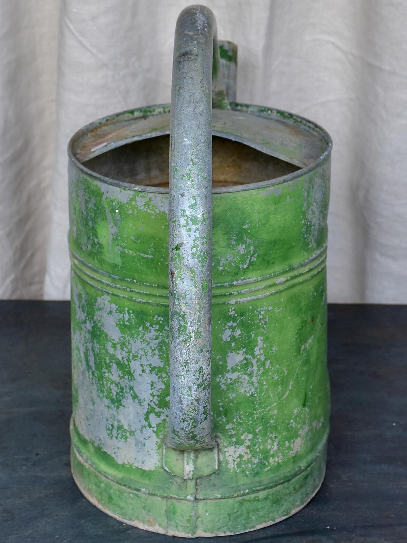 Early 20th Century watering can with green patina