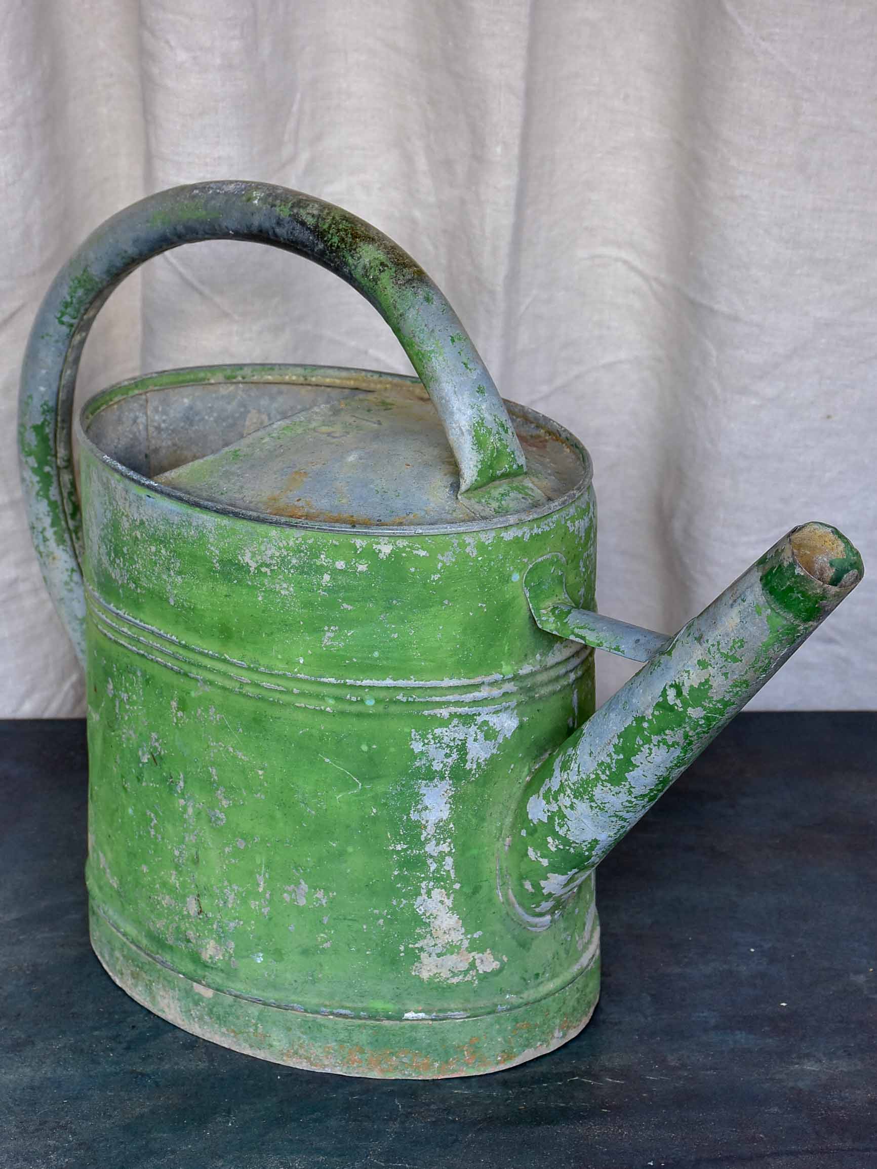 Early 20th Century watering can with green patina